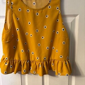Yellow Sleeveless Top with Floral Pattern